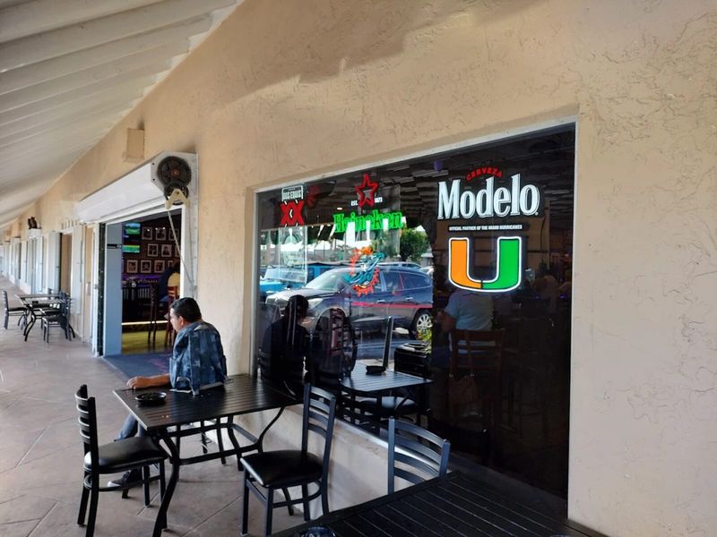 Outdoor patio seating at The Boulevard on Boynton Beach Blvd