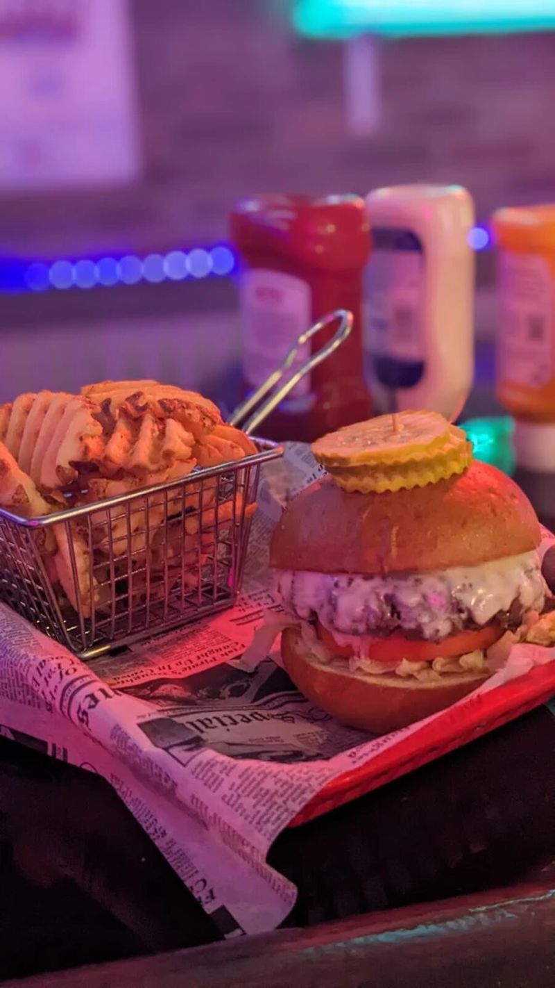 The BLVD Burger — Angus cheeseburger with seasoned fries in Boynton Beach